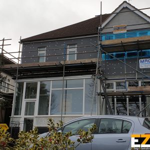 Corner detail showing EPS insulation fixing during External Wall Insulation Beckenham installation
