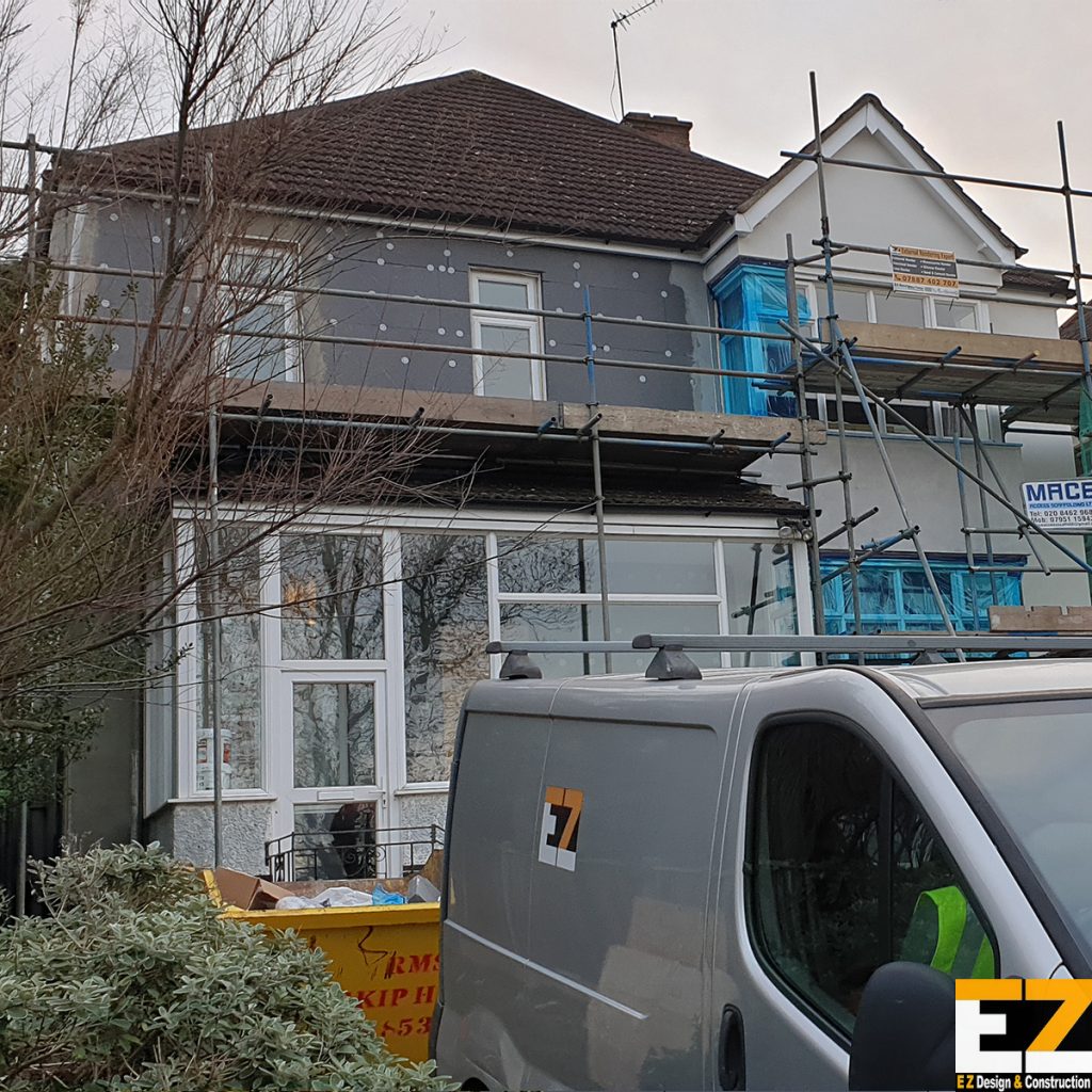 External wall insulation installation in progress with scaffolding in Beckenham